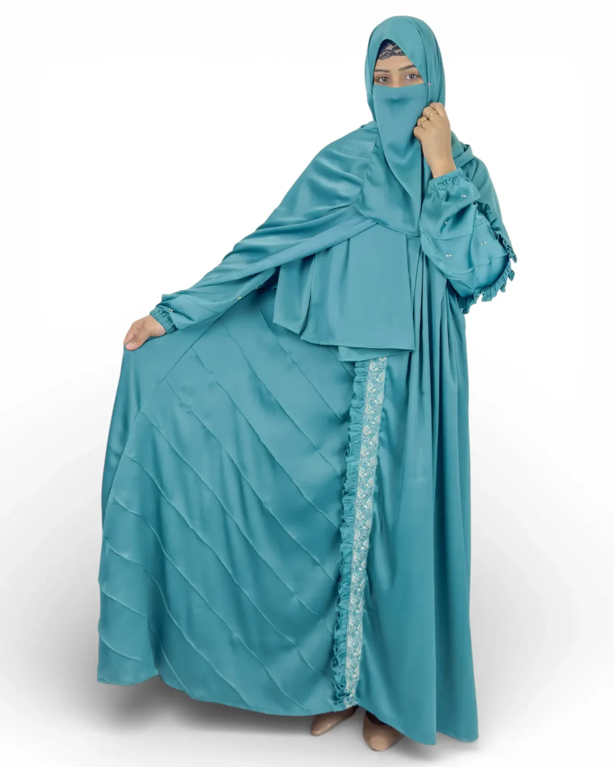 Ocean Lace teal satin abaya showing drape and embroidered lace detail at front