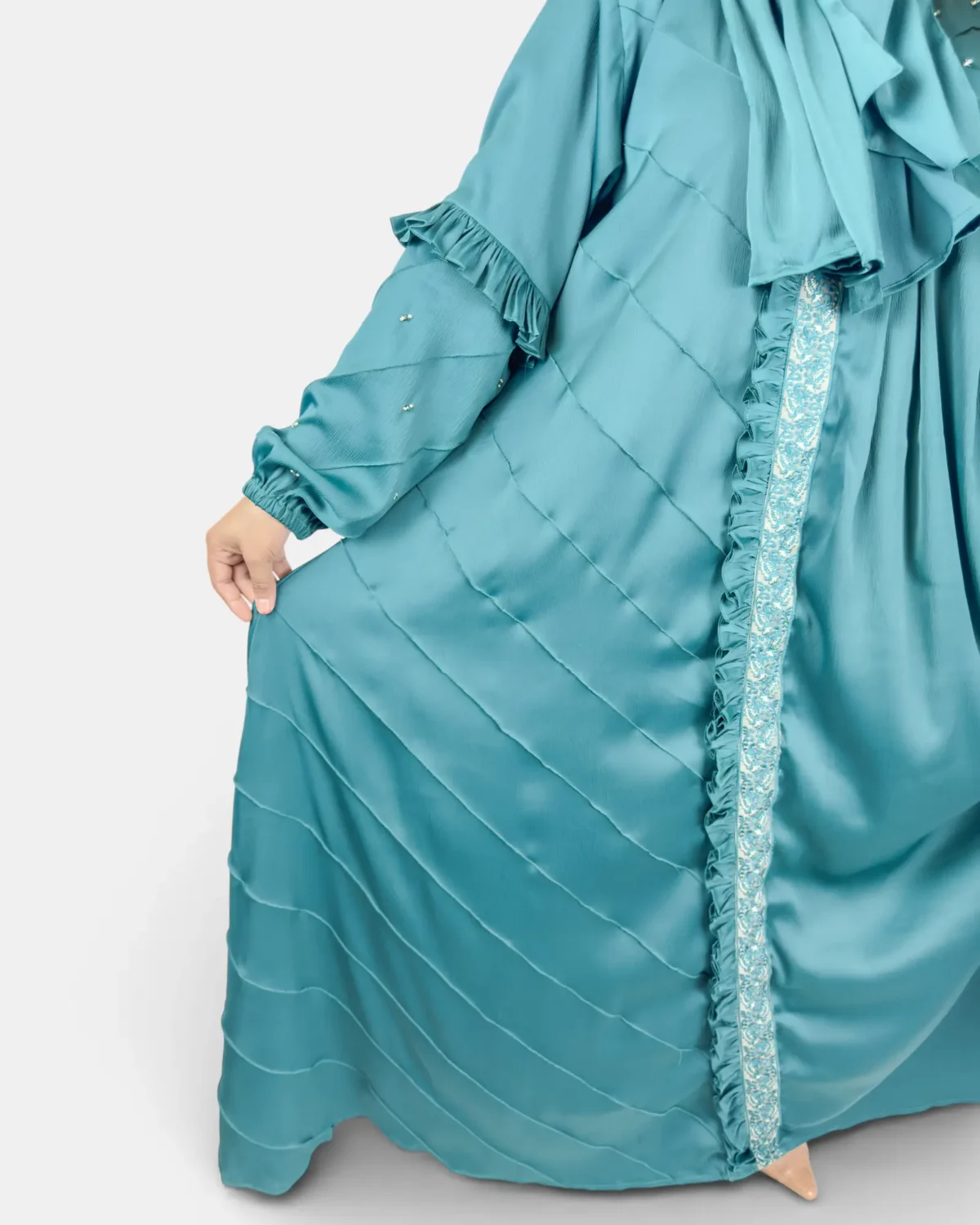 Ocean Lace abaya full length back view showing teal satin and ruffle cuff detail
