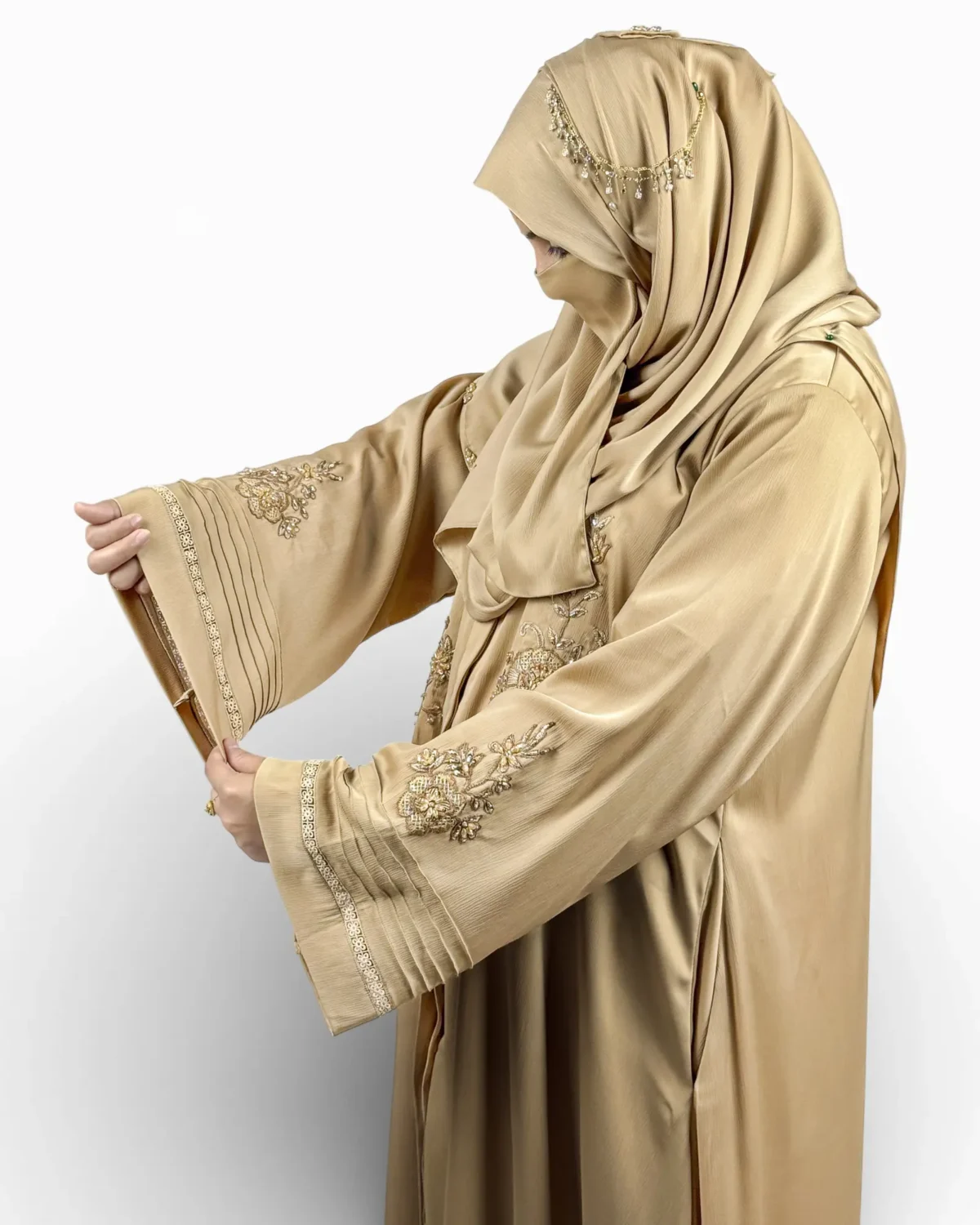 Aura golden satin abaya detail of gold sequin lace trim at pintucked sleeve cuff