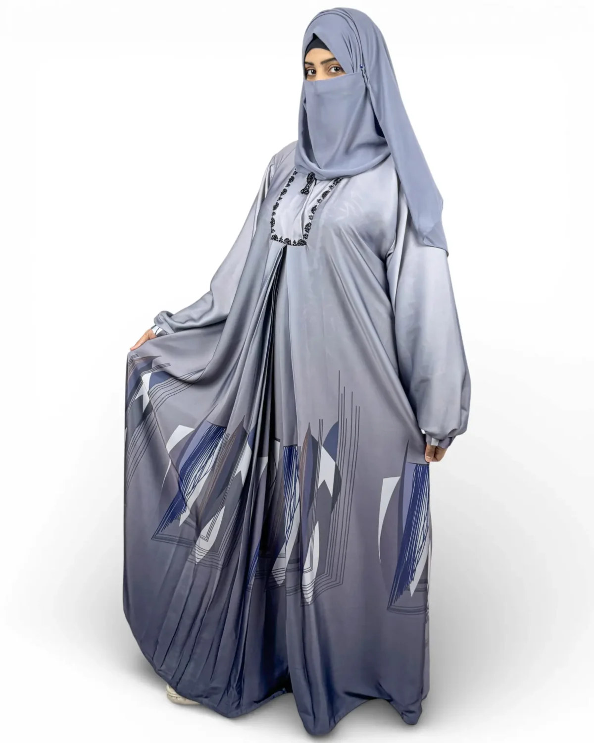 Skyline grey satin abaya full length view showing bold geometric angular print at hem