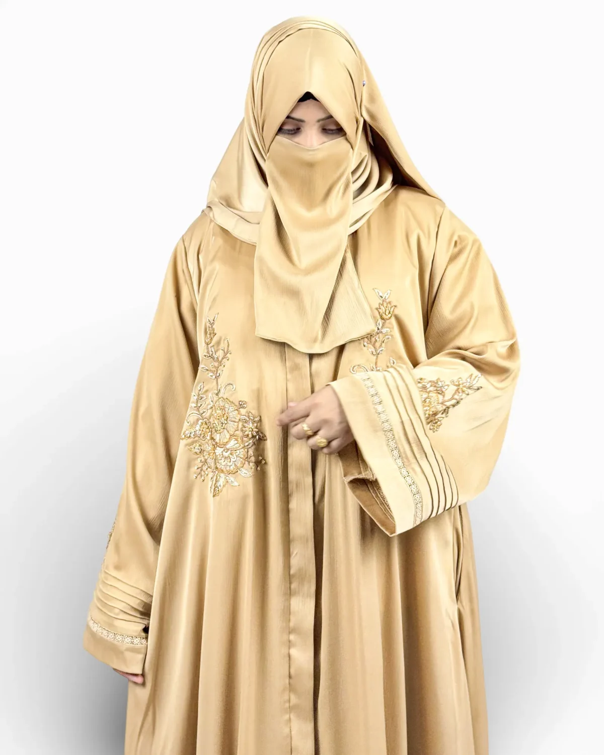 Aura camel abaya front view showing ornate 3D gold and silver floral embroidery at chest