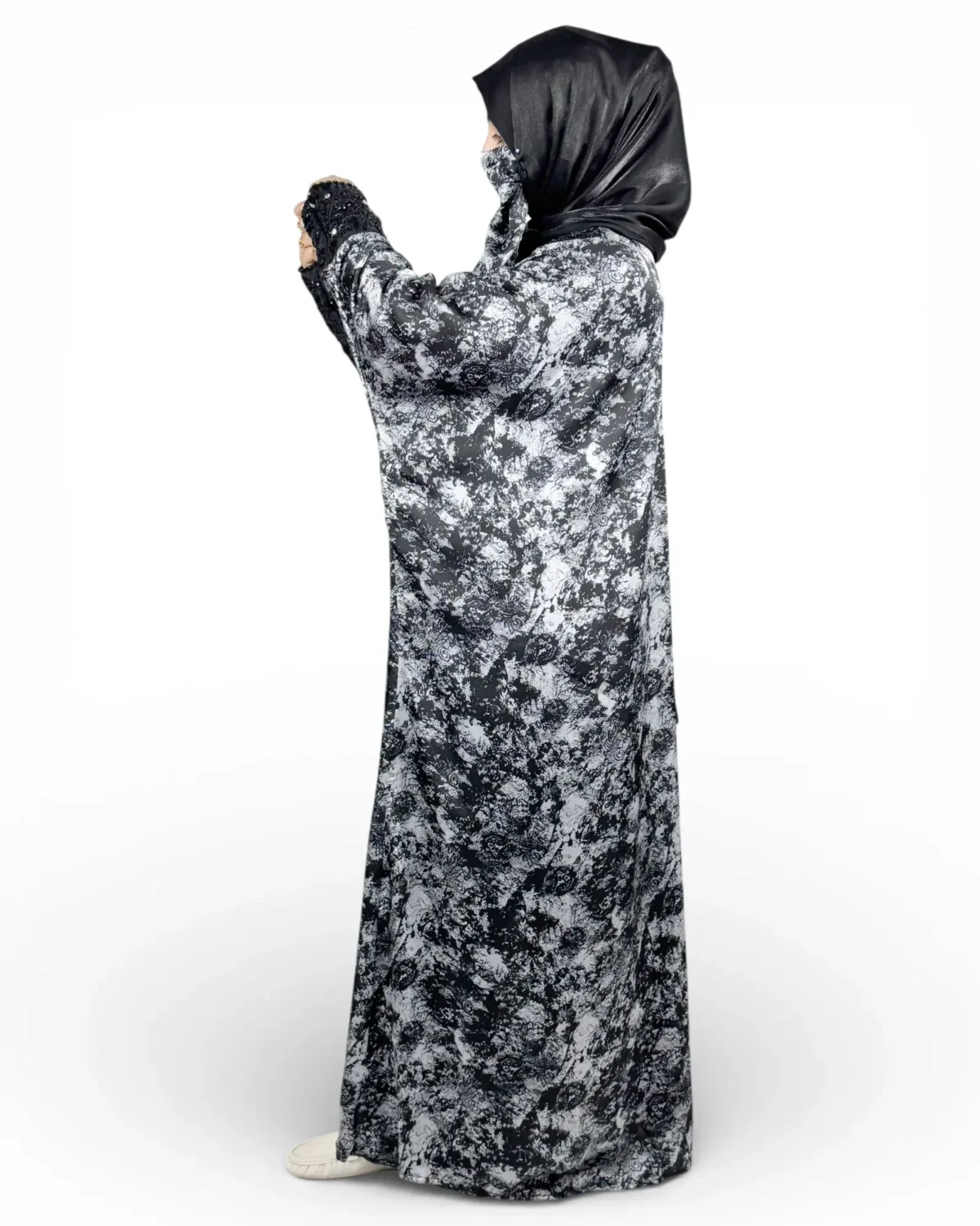 Midnight Snow abaya showing abstract floral botanical print in black and silver