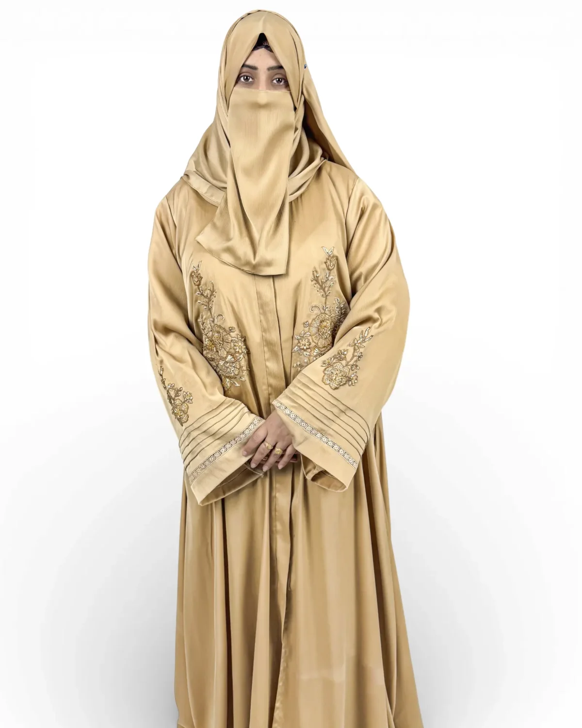 Aura golden abaya three-quarter view with gold sequin lace trim cuffs and pintuck texture