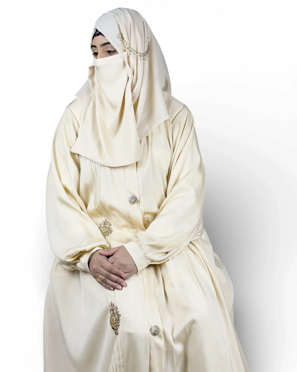 The Vanilla ivory abaya three-quarter view with voluminous pintucked balloon sleeves