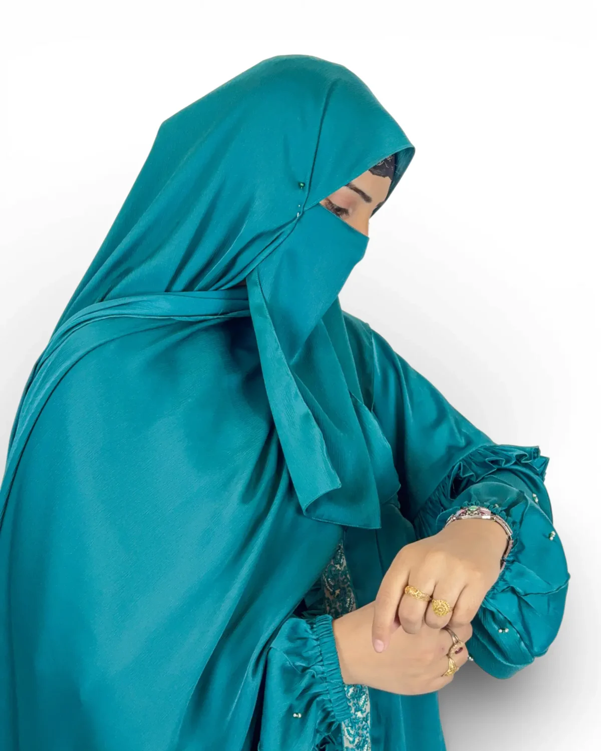 Ocean Lace abaya angled view with crystal scatter embellishments on body and sleeves