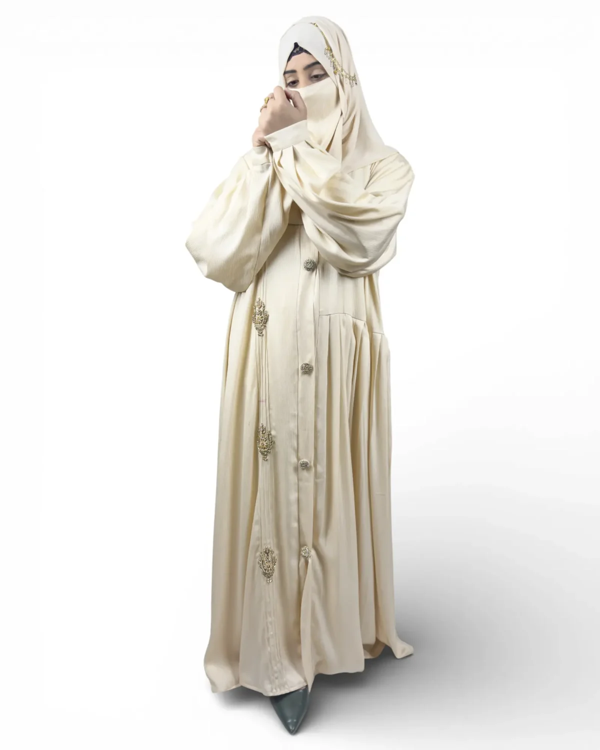 The Vanilla cream abaya full length view with jeweled ornament appliqués and balloon sleeves