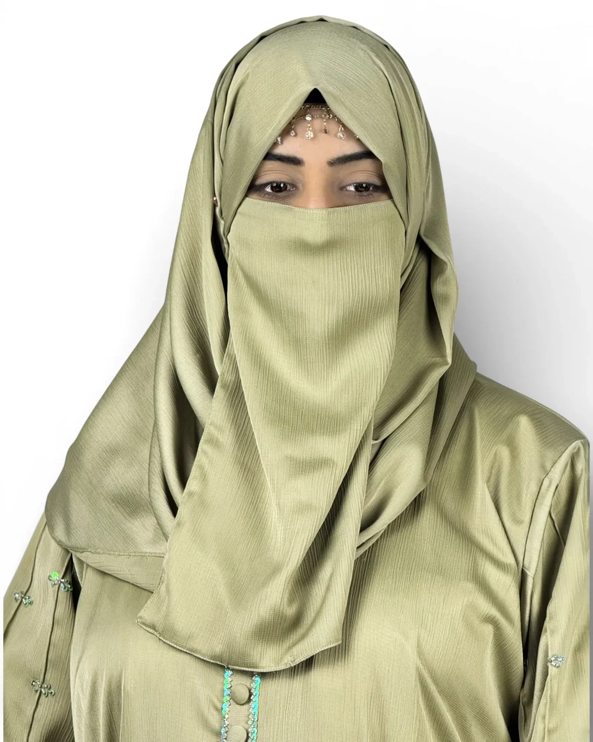 Olive Bloom khaki green abaya side view highlighting embroidered sleeves and skirt