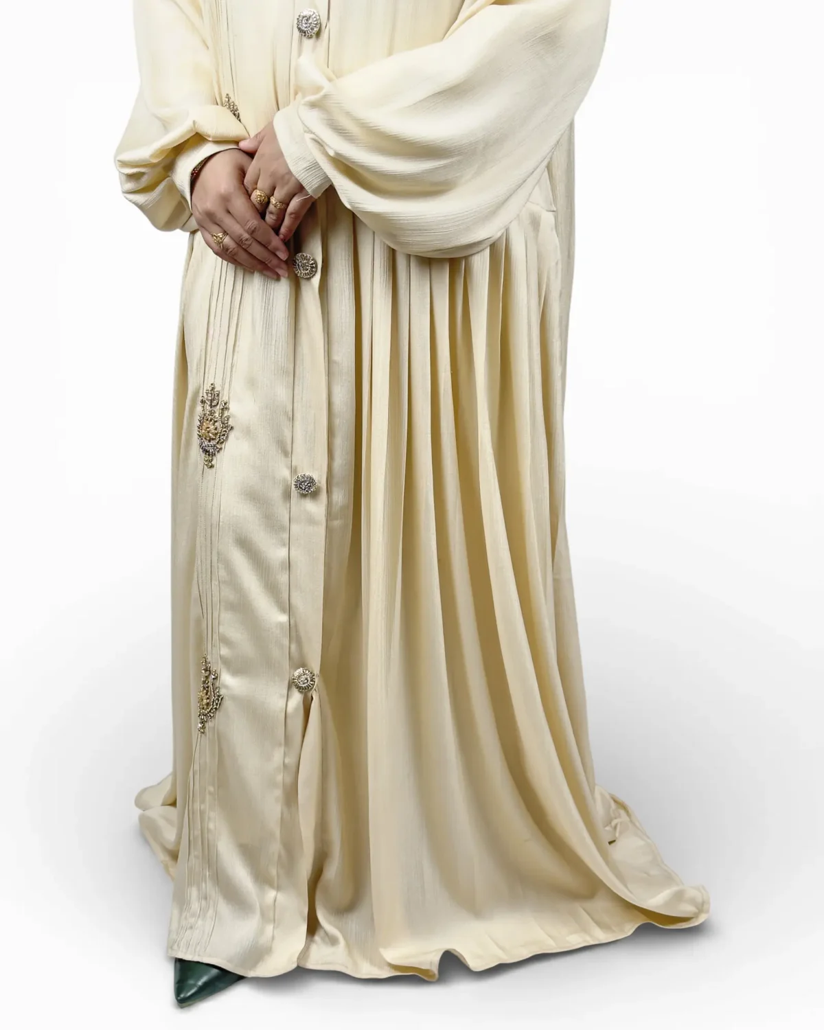 The Vanilla off-white abaya lower body detail showing floor-length pintucked skirt drape