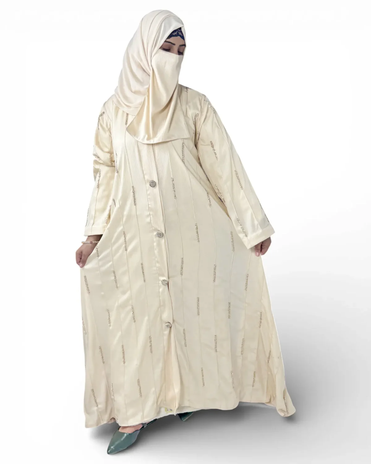 Royal Ivory cream satin abaya full length front view with decorative buttons and pintuck detail