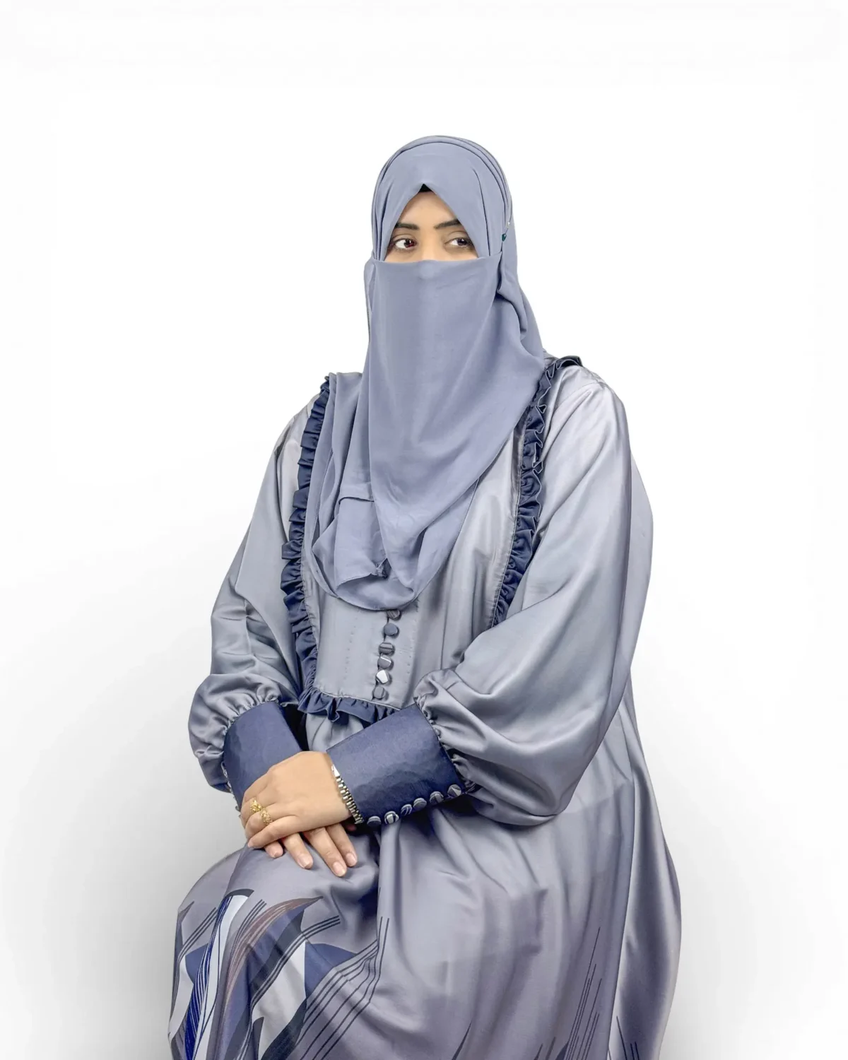 Azure Mist steel-blue abaya with matching grey-blue hijab and geometric angular hem print