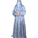 Blue Tiers dusty blue abaya front view with softly tiered high-sheen satin skirt