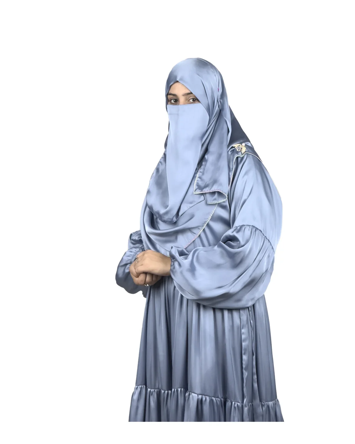 Blue Tiers dusty blue abaya front three-quarter view with softly tiered high-sheen satin skirt