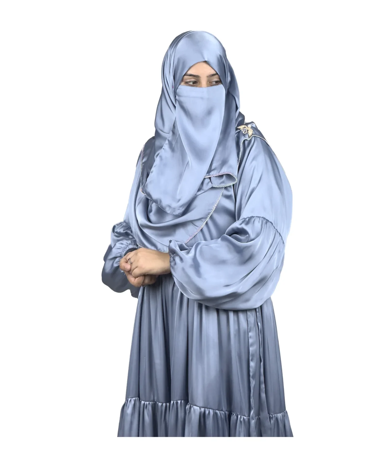 Blue Tiers dusty blue abaya front three-quarter view with softly tiered high-sheen satin skirt