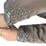 Copper Lily copper / warm dark brown abaya close-up of the sequinned flower petals on the cuff