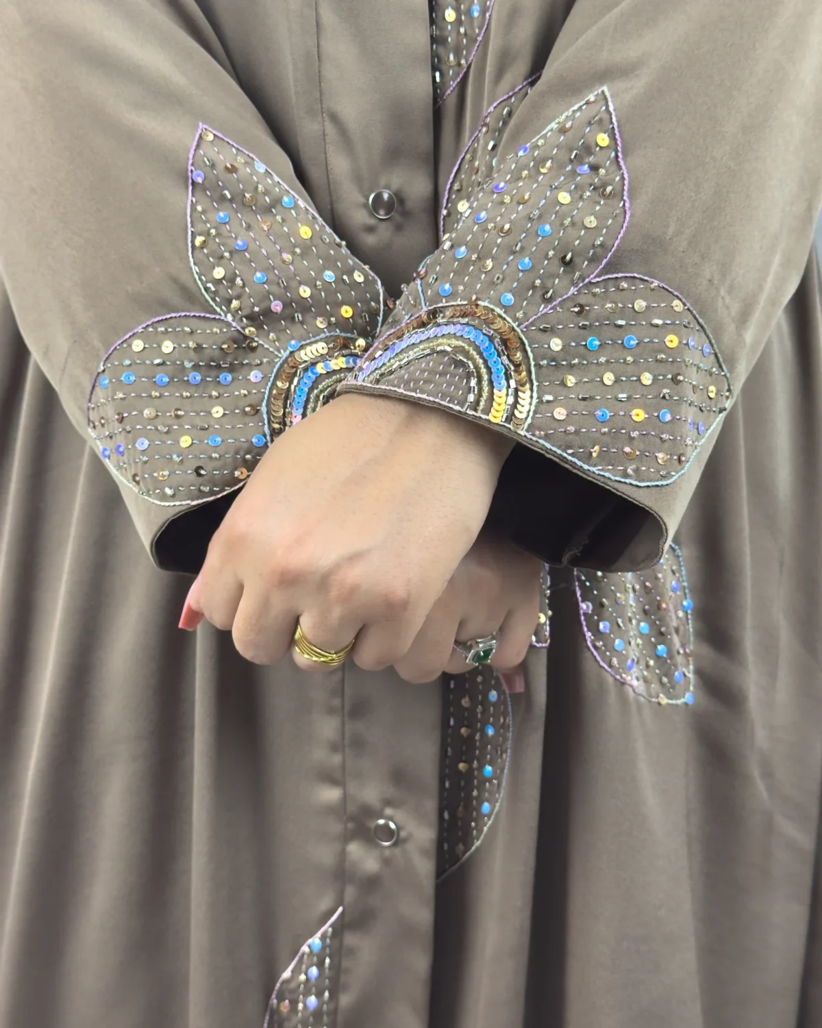 Copper Lily copper / warm dark brown abaya close-up of the sequinned flower petals on the cuff