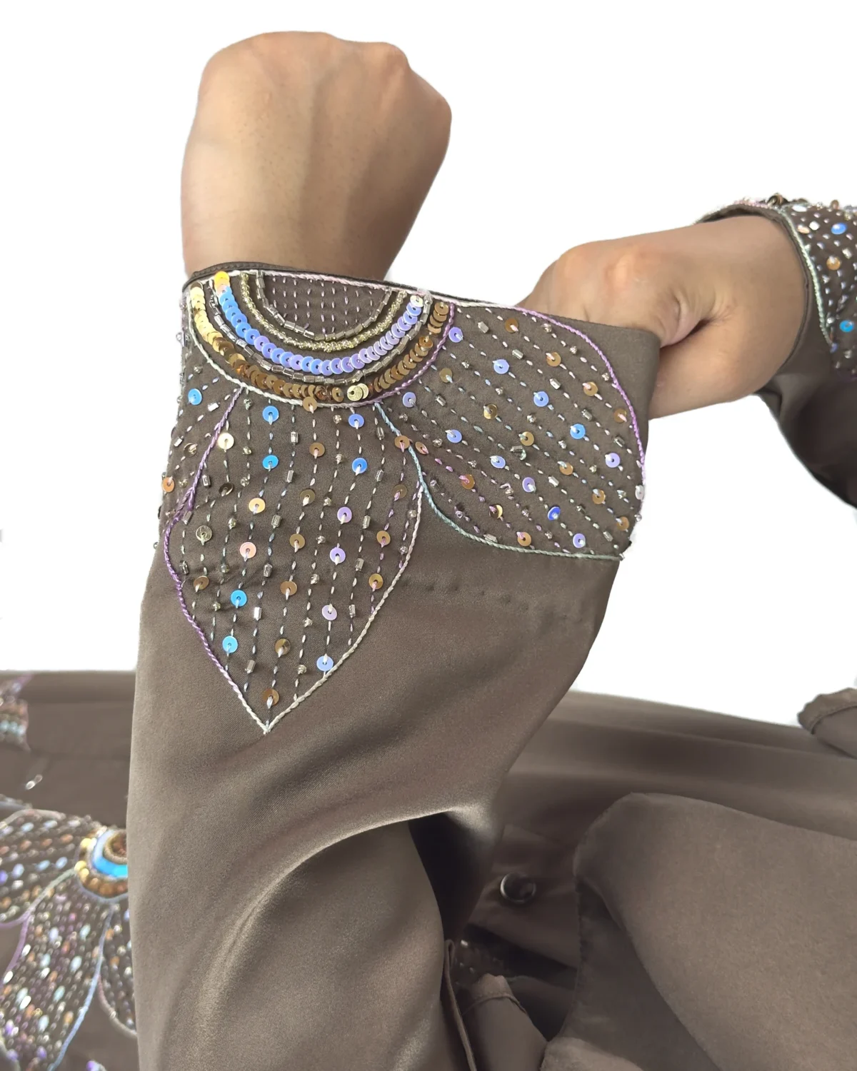 Copper Lily copper / warm dark brown abaya close-up of the sequinned flower petals on the cuff