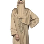 Desert Gold camel / sand beige abaya front three-quarter view with ornate gold-beaded medallion and gold-banded cuffs