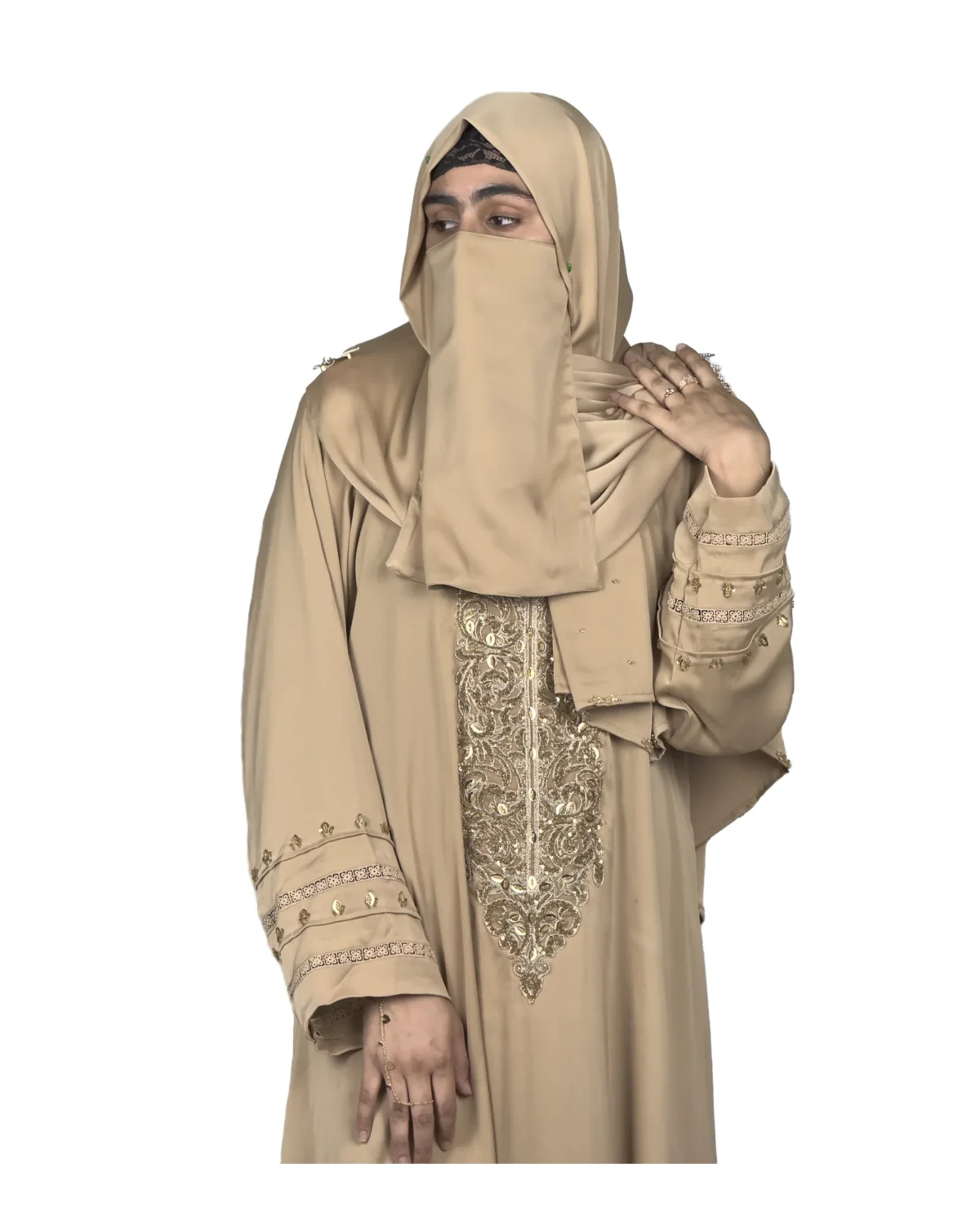 Desert Gold camel / sand beige abaya front three-quarter view with ornate gold-beaded medallion and gold-banded cuffs