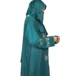 Emerald Garden emerald teal abaya side profile view with antique-gold floral sprays and pintuck detail