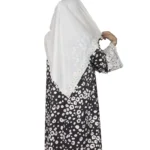 Frost Lace black & white abstract spot print abaya back view with black-and-white spot print with hand-embellished white lace cuffs