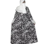 Frost Lace black & white abstract spot print abaya front view with black-and-white spot print with hand-embellished white lace cuffs