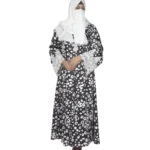 Frost Lace black & white abstract spot print abaya front view with black-and-white spot print with hand-embellished white lace cuffs