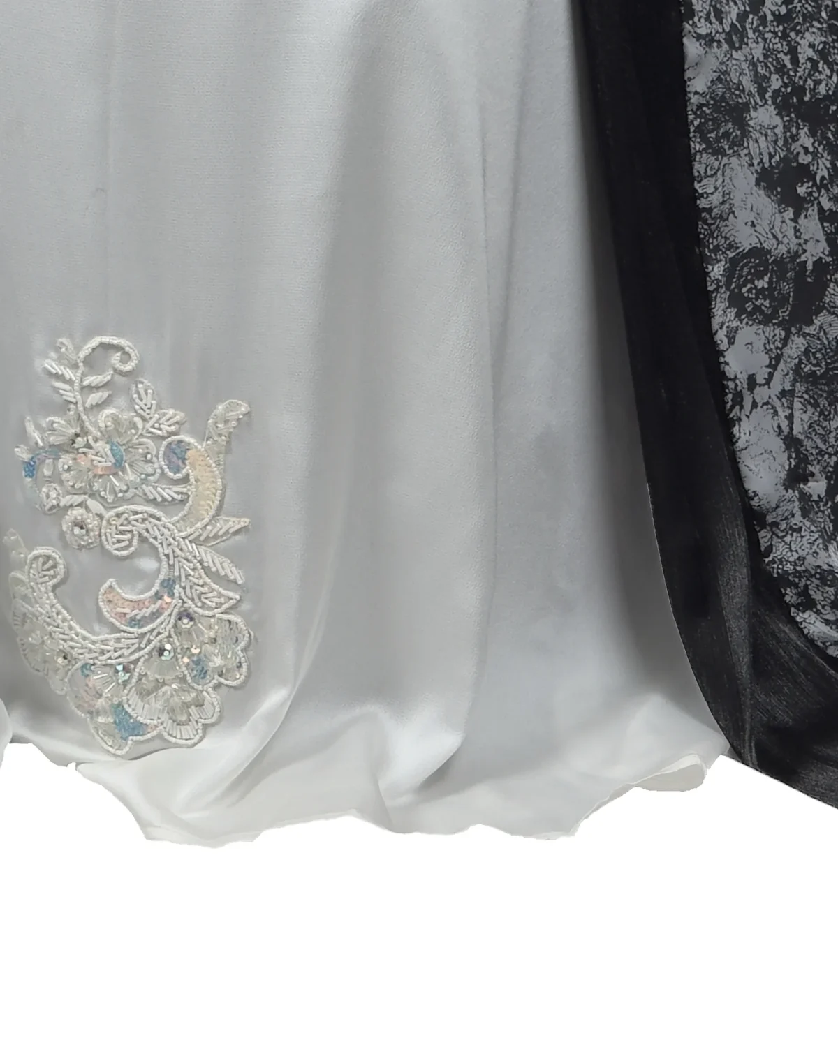 Marble Peacock black & white marble print with a white satin underlay abaya close-up of the beaded appliqué and sweeping train