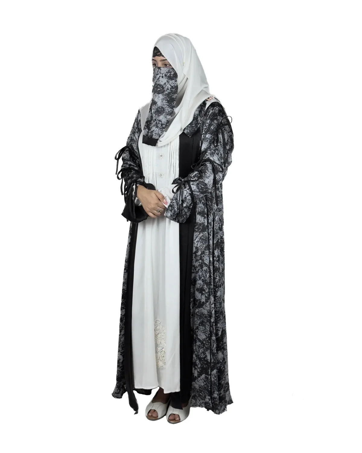 Marble Peacock black & white marble print with a white satin underlay abaya front view with marble-print open coat over a white satin slip