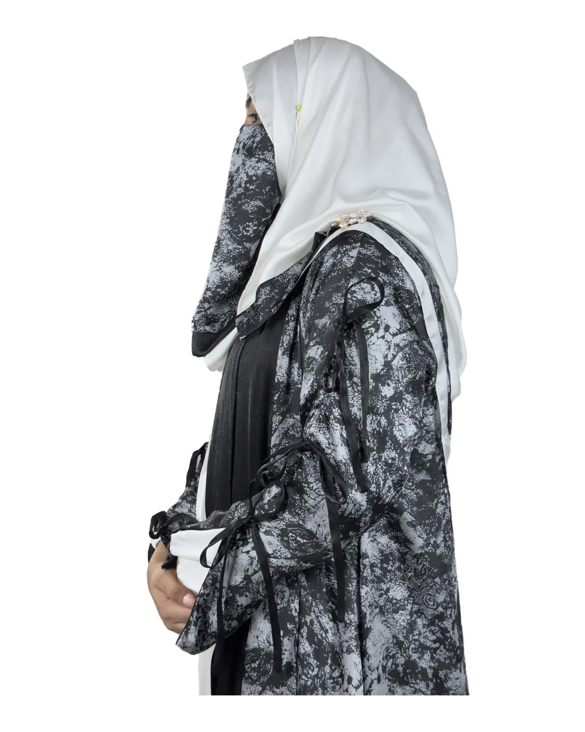 Marble Peacock black & white marble print with a white satin underlay abaya side profile view with marble-print open coat over a white satin slip