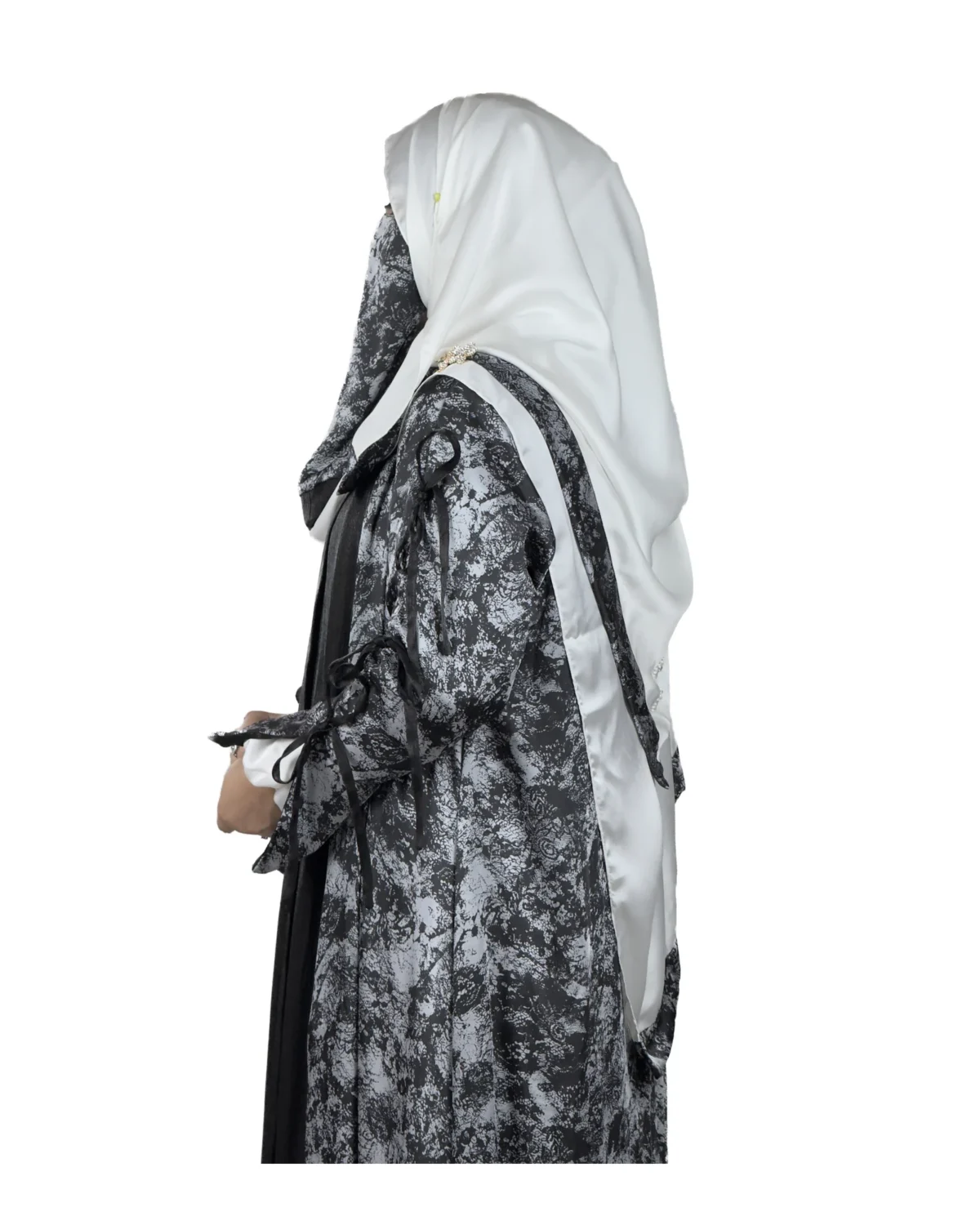 Marble Peacock black & white marble print with a white satin underlay abaya side profile view with marble-print open coat over a white satin slip