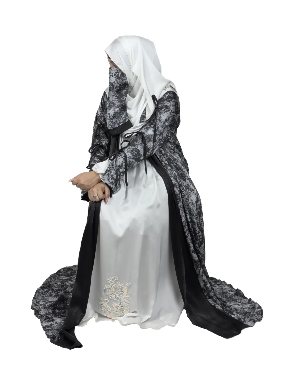 Marble Peacock black & white marble print with a white satin underlay abaya front three-quarter view with marble-print open coat over a white satin slip
