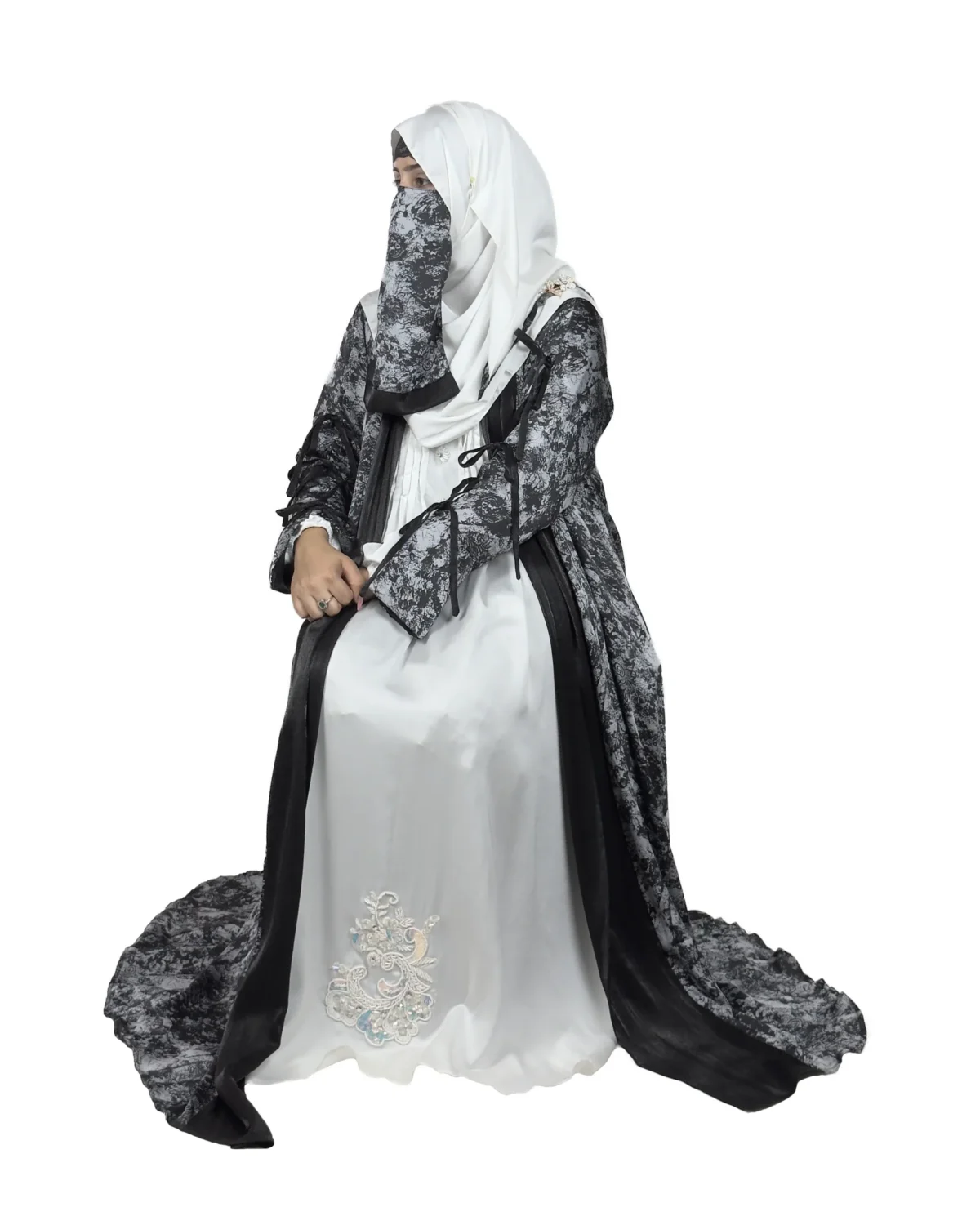 Marble Peacock black & white marble print with a white satin underlay abaya front three-quarter view with marble-print open coat over a white satin slip