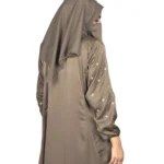 Mocha Starlight mocha / warm dark brown abaya side profile view with hand-embroidered cream-gold star flowers