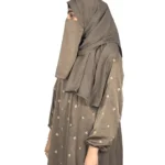 Mocha Starlight mocha / warm dark brown abaya front three-quarter view with hand-embroidered cream-gold star flowers