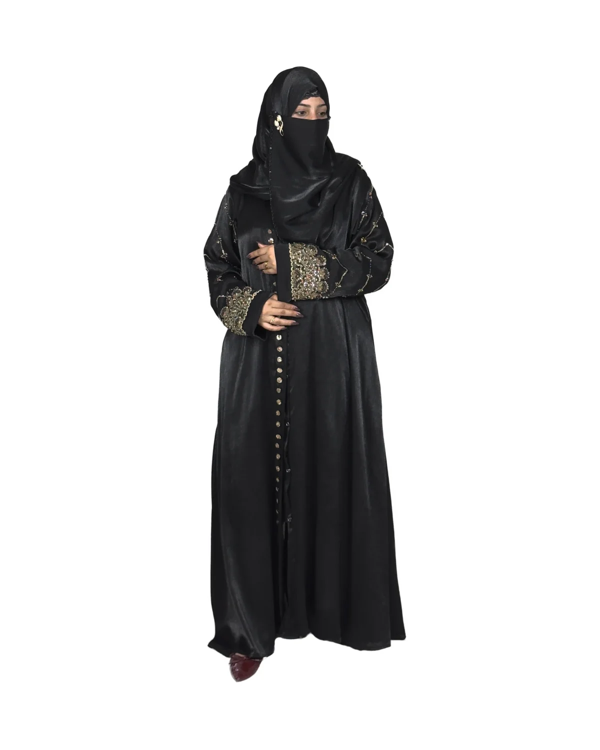 Onyx Gold black abaya front view with gold-and-black beaded cuffs and sequin-flower buttons