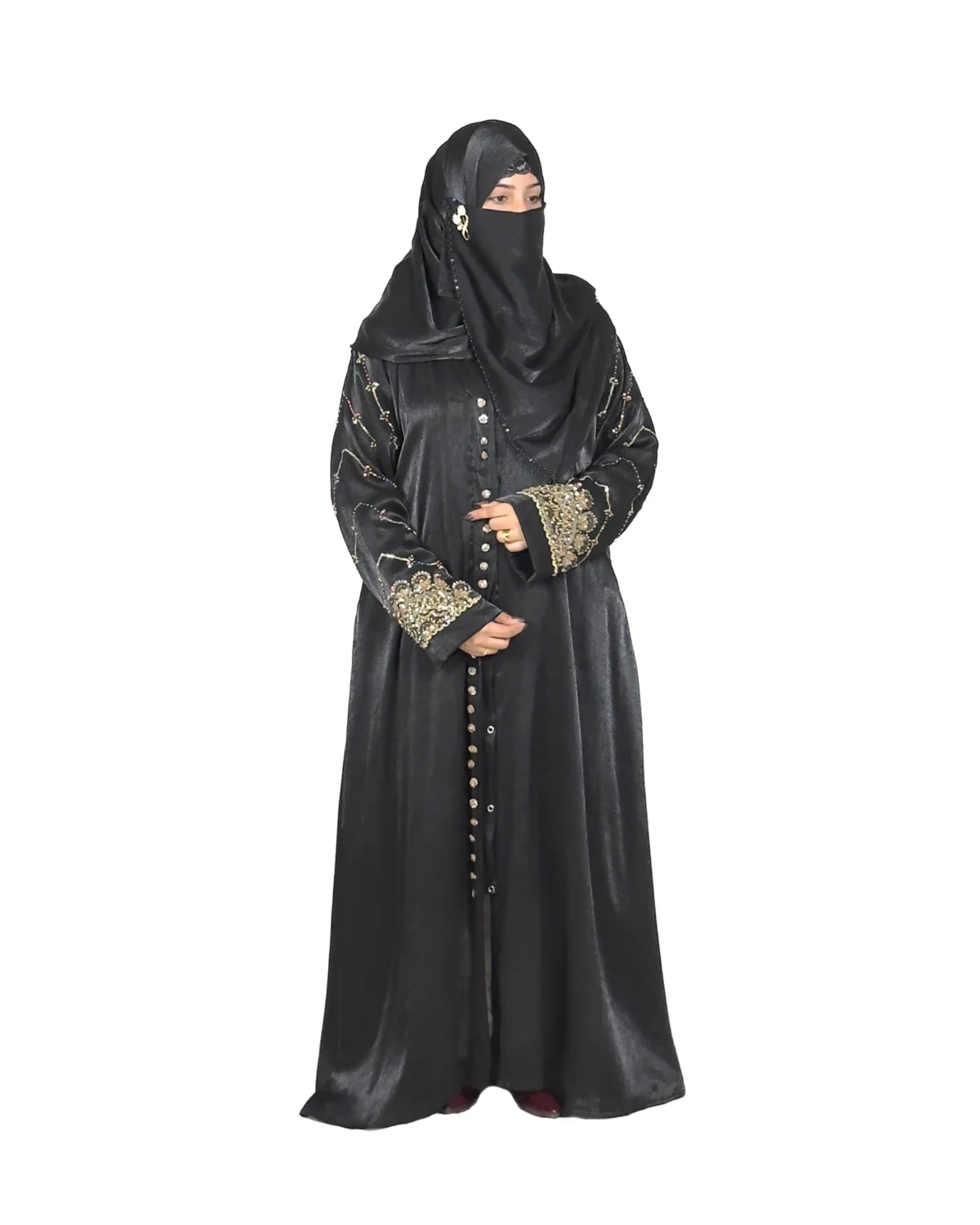 Onyx Gold black abaya front view with gold-and-black beaded cuffs and sequin-flower buttons