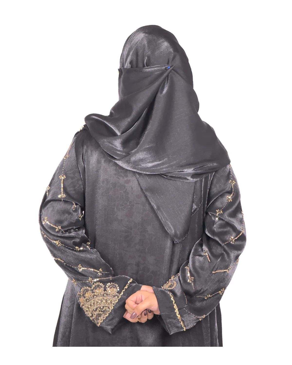 Onyx Gold black abaya front view with gold-and-black beaded cuffs and sequin-flower buttons