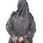 Onyx Gold black abaya front view with gold-and-black beaded cuffs and sequin-flower buttons