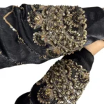 Onyx Gold black abaya close-up of the gold-and-black beaded scalloped cuff