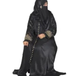 Onyx Gold black abaya front three-quarter view with gold-and-black beaded cuffs and sequin-flower buttons