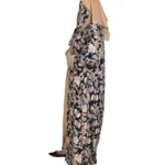 Paisley Rose navy paisley-floral print with a built-in camel inner layer abaya side profile view with navy paisley print with a gold sequin border
