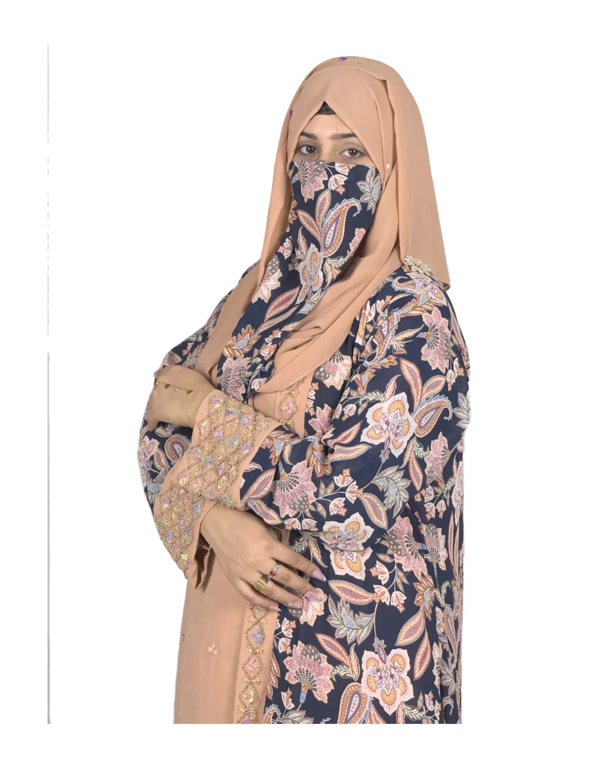 Paisley Rose navy paisley-floral print with a built-in camel inner layer abaya front three-quarter view with navy paisley print with a gold sequin border