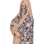 Paisley Rose navy paisley-floral print with a built-in camel inner layer abaya front three-quarter view with navy paisley print with a gold sequin border