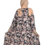 Paisley Rose navy paisley-floral print with a built-in camel inner layer abaya front three-quarter view with navy paisley print with a gold sequin border