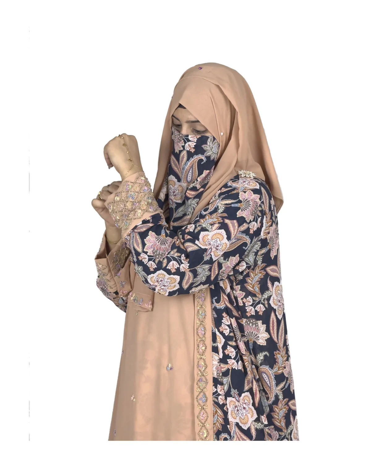 Paisley Rose navy paisley-floral print with a built-in camel inner layer abaya front three-quarter view with navy paisley print with a gold sequin border