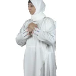 Pearl Drape white abaya front three-quarter view with saree-style drape and multicolour beaded cuffs