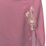 Ruby Bloom deep maroon / wine abaya close-up of the hand-beaded gold floral motif at the hem slit