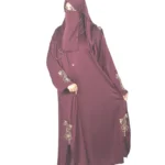 Ruby Bloom deep maroon / wine abaya front three-quarter view with hand-beaded gold floral motifs on the cuffs and hem slits