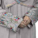 Silver Garden light silver-grey abaya close-up of the multicolour floral vine embroidery on the cuff