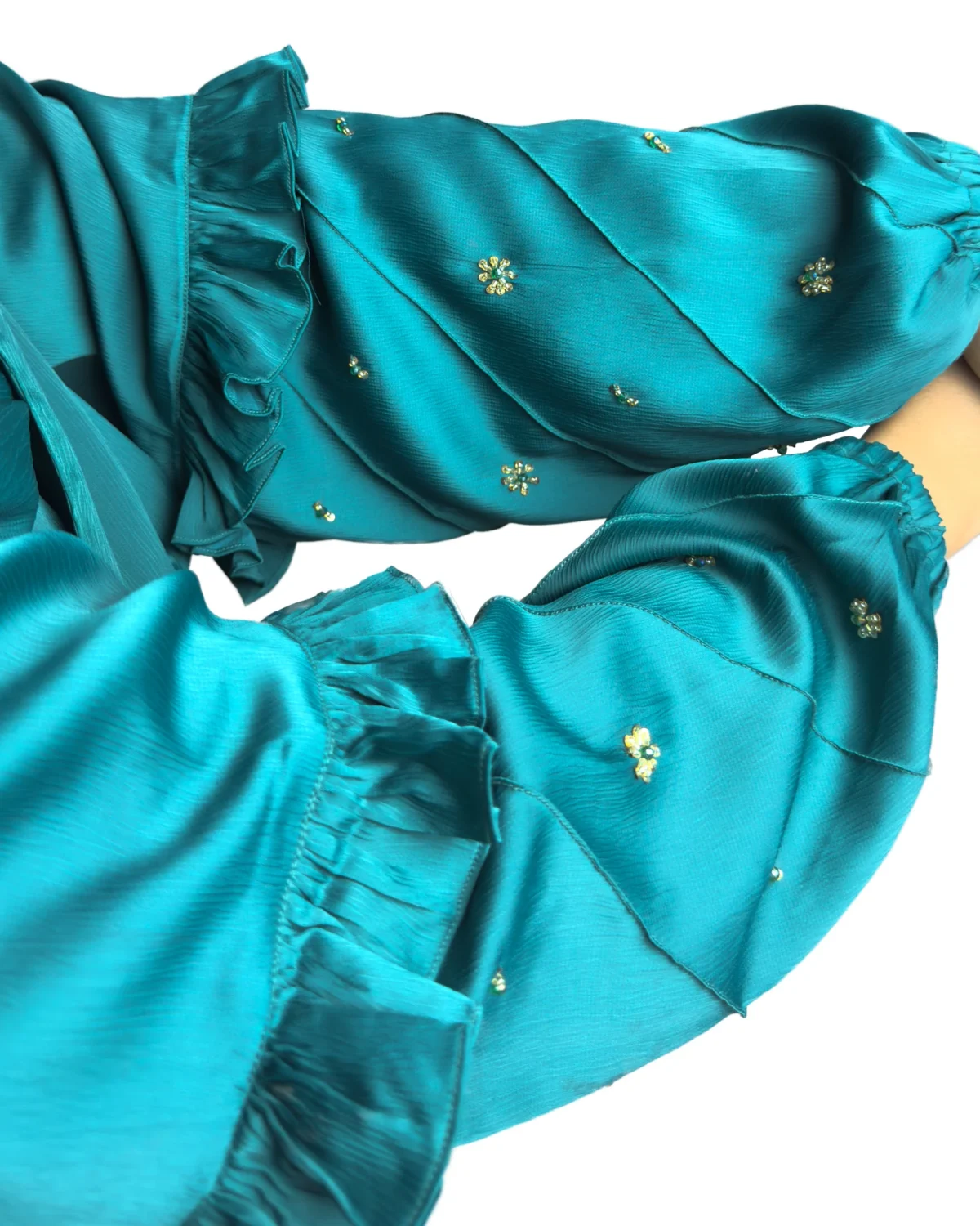 Teal Wave peacock teal abaya close-up of the ruffled tiered sleeve